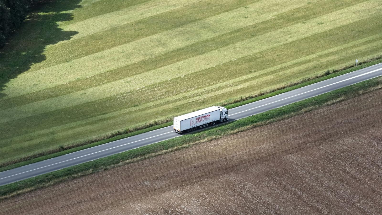 Truck crossing farmland on a long-haul run